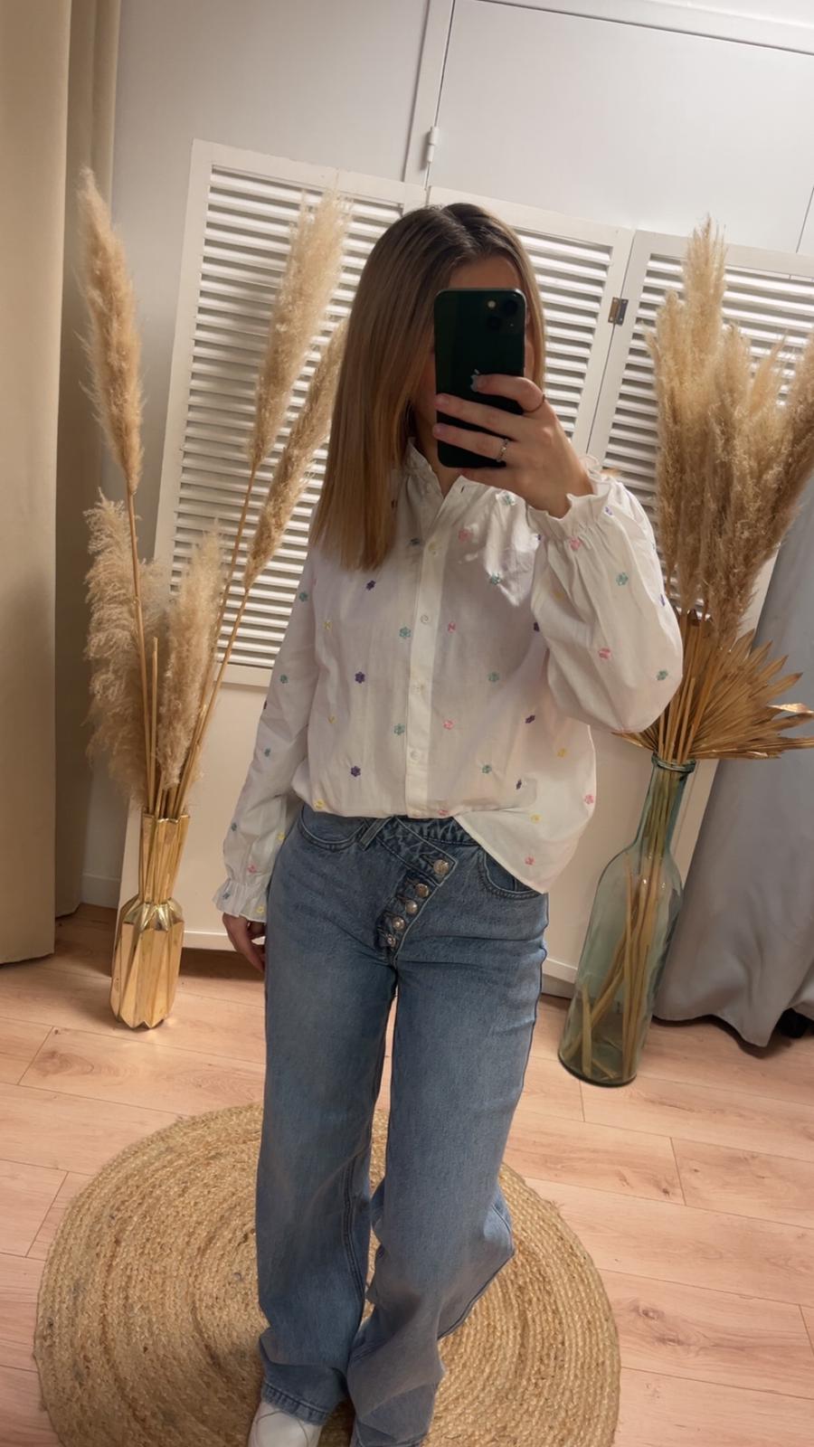 Jean boutonnière asymétriques